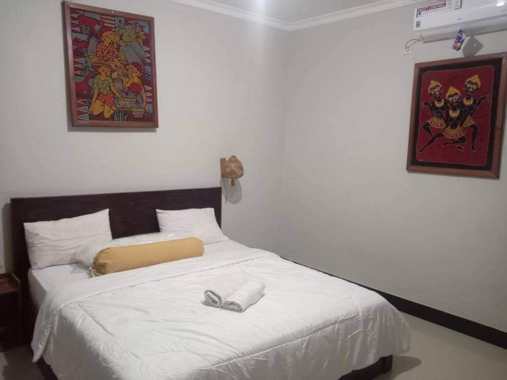 Kri Homestay Kuta  ภายนอก รูปภาพ