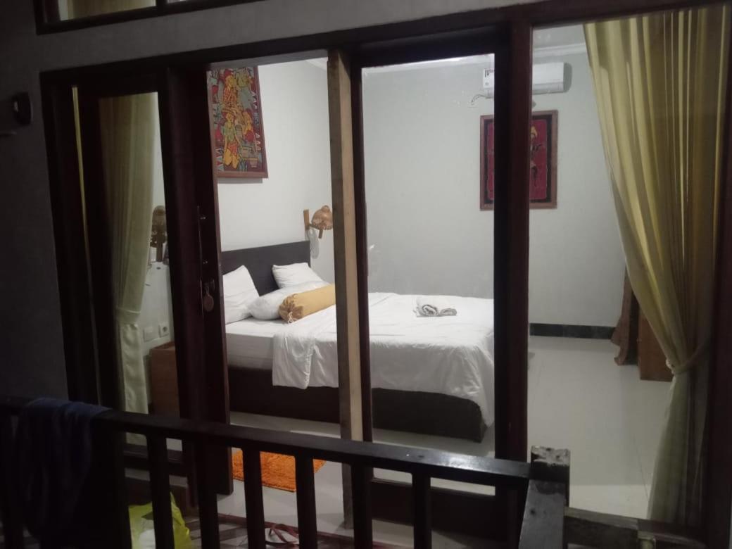 Kri Homestay Kuta  ภายนอก รูปภาพ