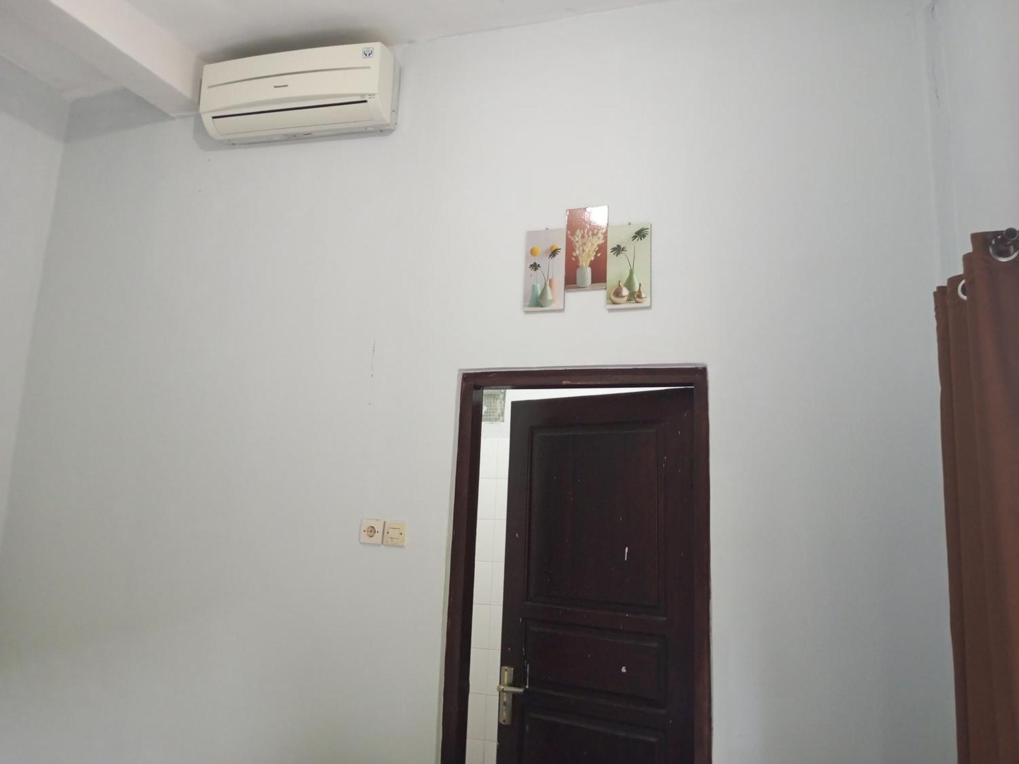Kri Homestay Kuta  ห้อง รูปภาพ