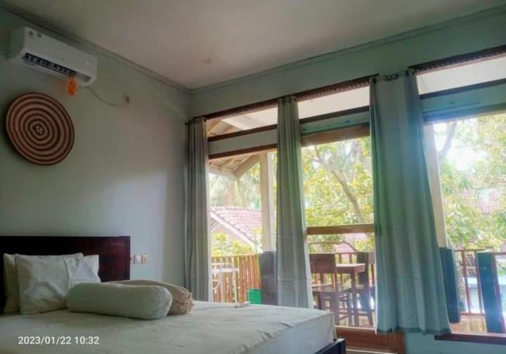 Kri Homestay Kuta  ภายนอก รูปภาพ