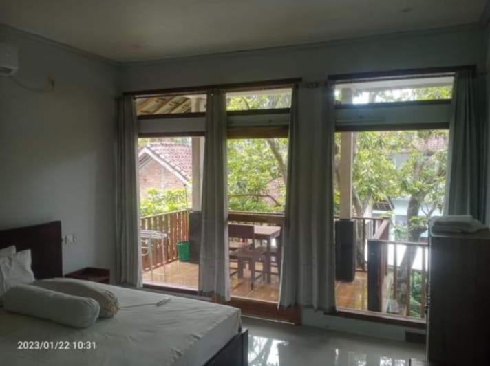Kri Homestay Kuta  ภายนอก รูปภาพ
