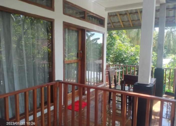 Kri Homestay Kuta  ภายนอก รูปภาพ