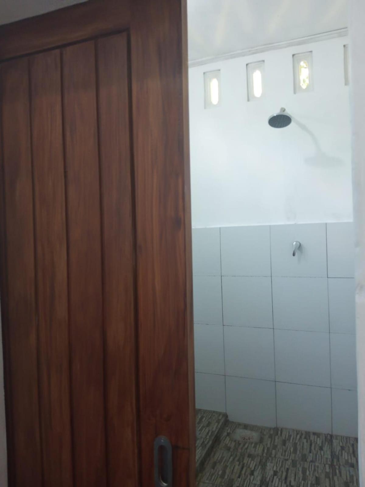 Kri Homestay Kuta  ภายนอก รูปภาพ