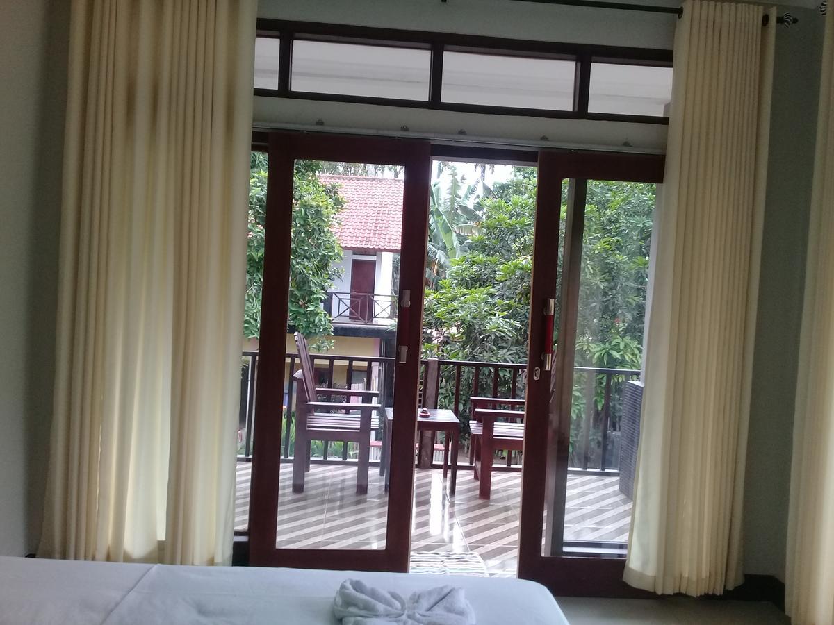 Kri Homestay Kuta  ภายนอก รูปภาพ