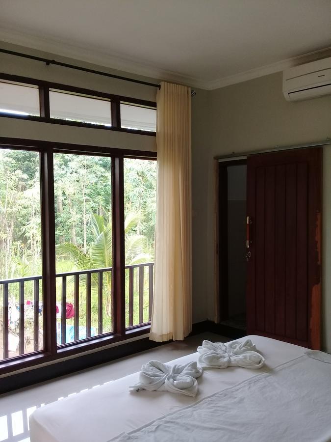 Kri Homestay Kuta  ภายนอก รูปภาพ