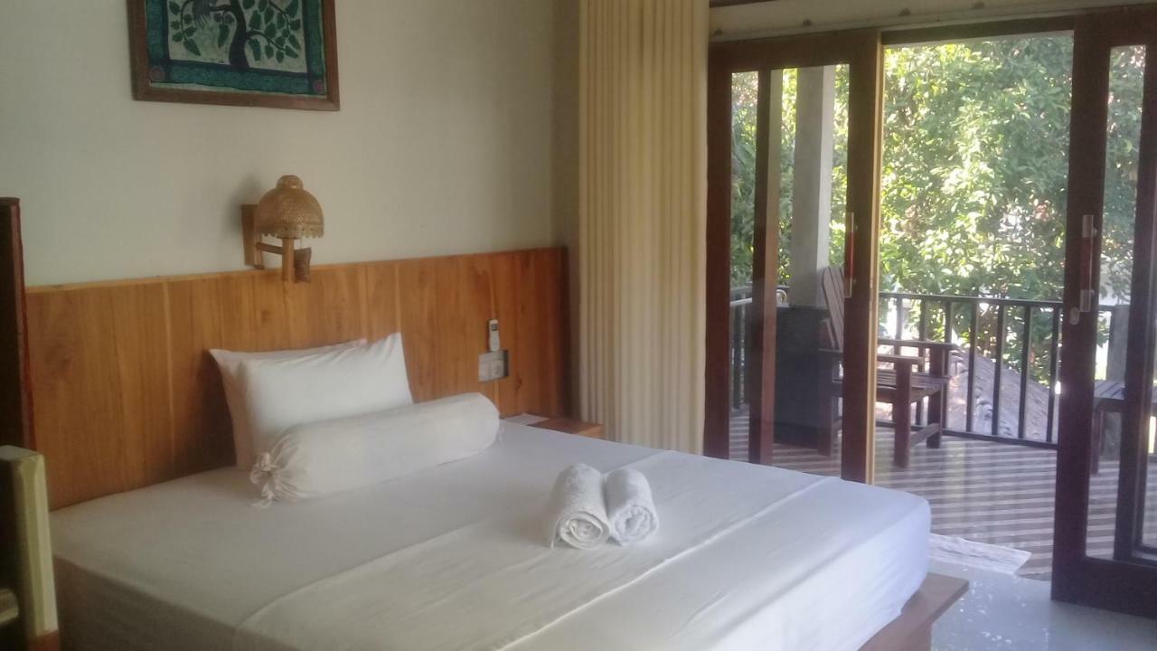 Kri Homestay Kuta  ภายนอก รูปภาพ